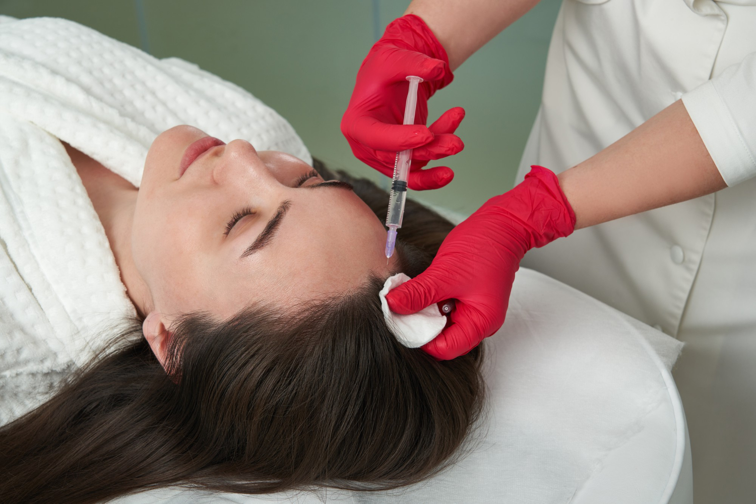 Specialist performing ACell Micromatrix injections for hair restoration in Riyadh Clinic